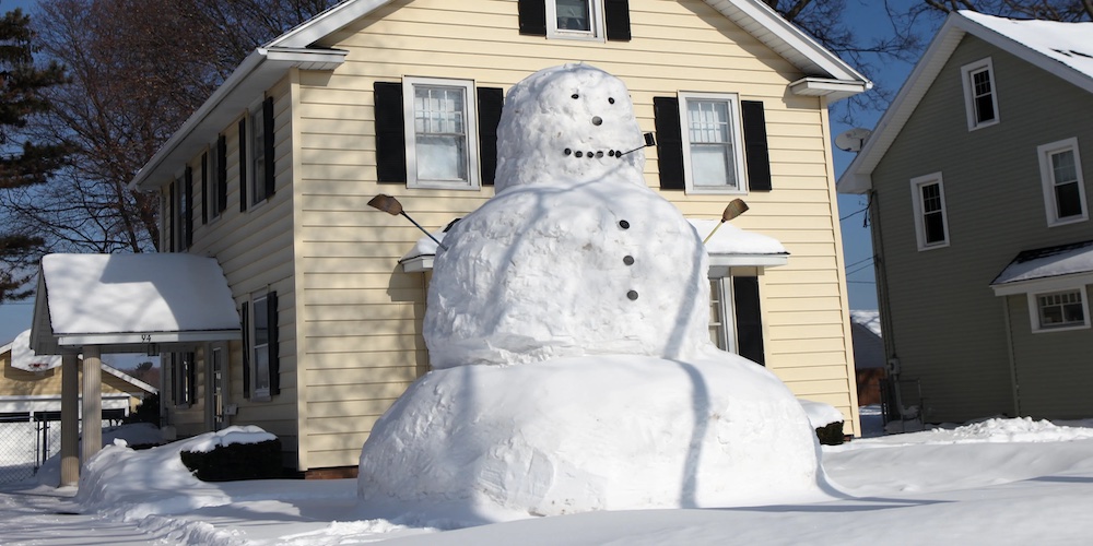 a snowman as big as a house